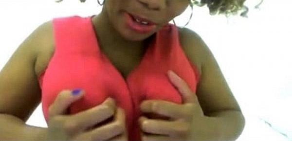  Mature ebony in pink dress sucks dildo on webcam  - more videos on dslwebcam.com